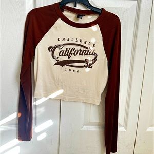 brown and badge long sleeve crop